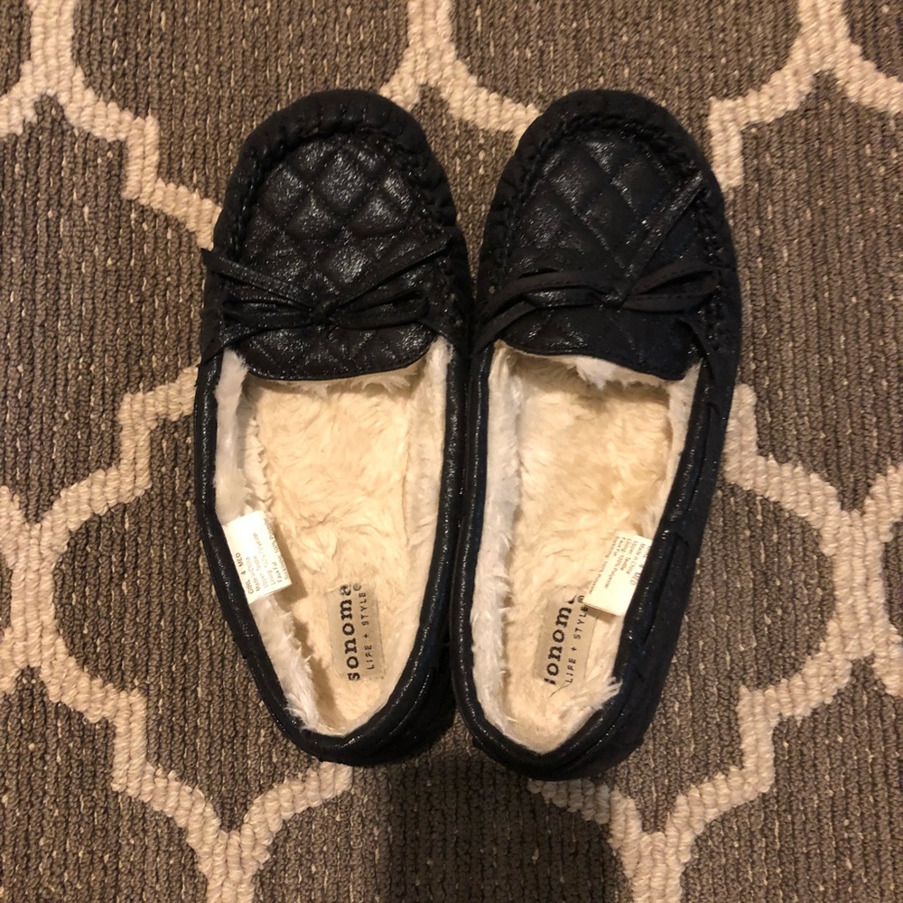 Women’s black moccasins